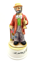 Musical Emmett Kelly Jr. Figurine with Golden Horn by Flambro Bisque Porcelain 7.5"  high. Plays Send In The Clowns