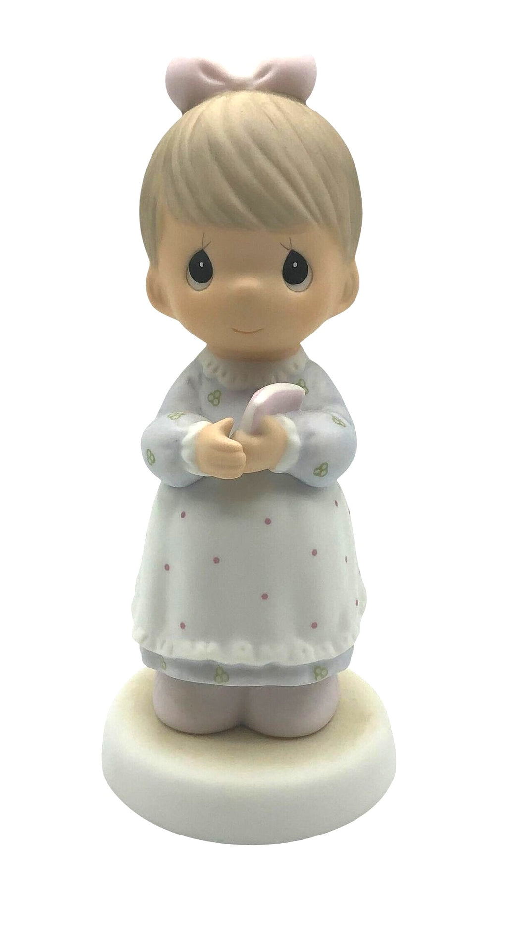 Precious Moments "The Good Lord Always Delivers" Porcelain Figurine. Features a little expectant mom perusing a book of baby names.