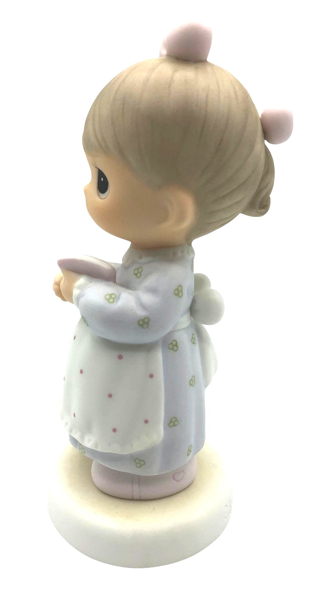 Precious Moments "The Good Lord Always Delivers" Porcelain Figurine. Features a little expectant mom perusing a book of baby names.