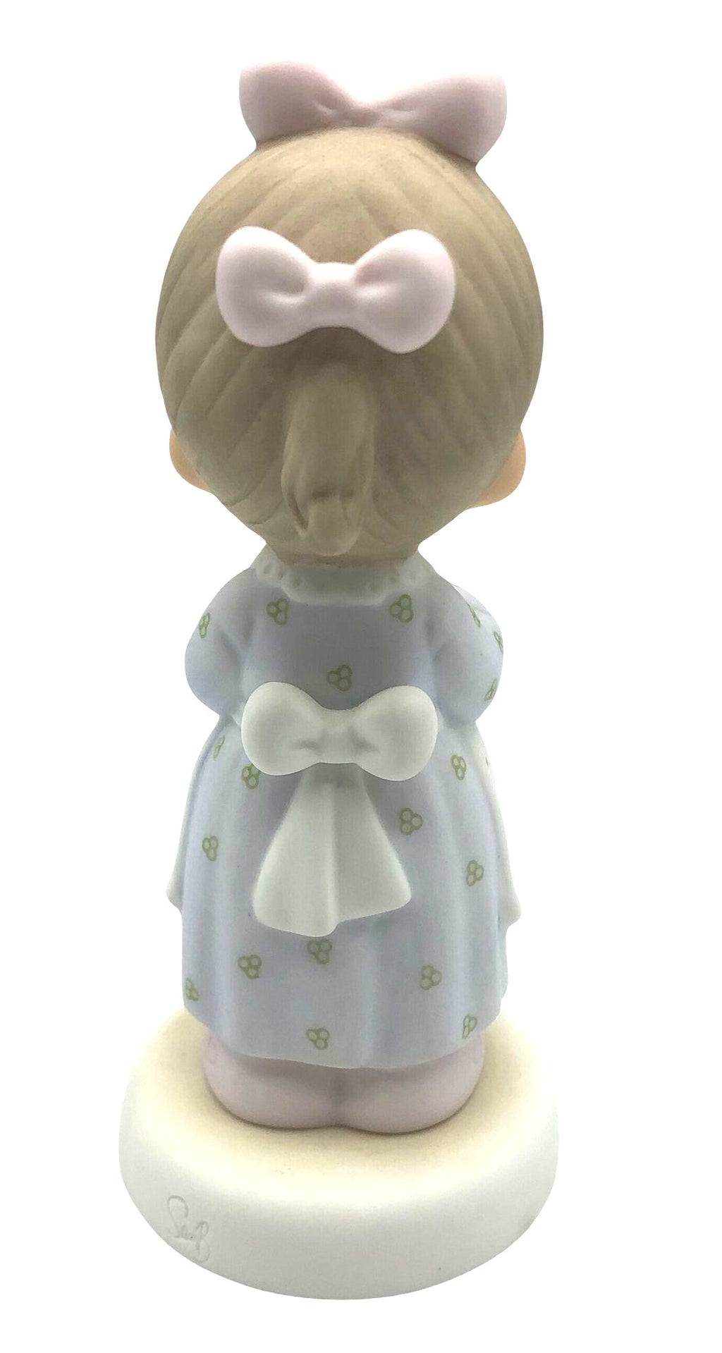 Precious Moments "The Good Lord Always Delivers" Porcelain Figurine. Features a little expectant mom perusing a book of baby names.