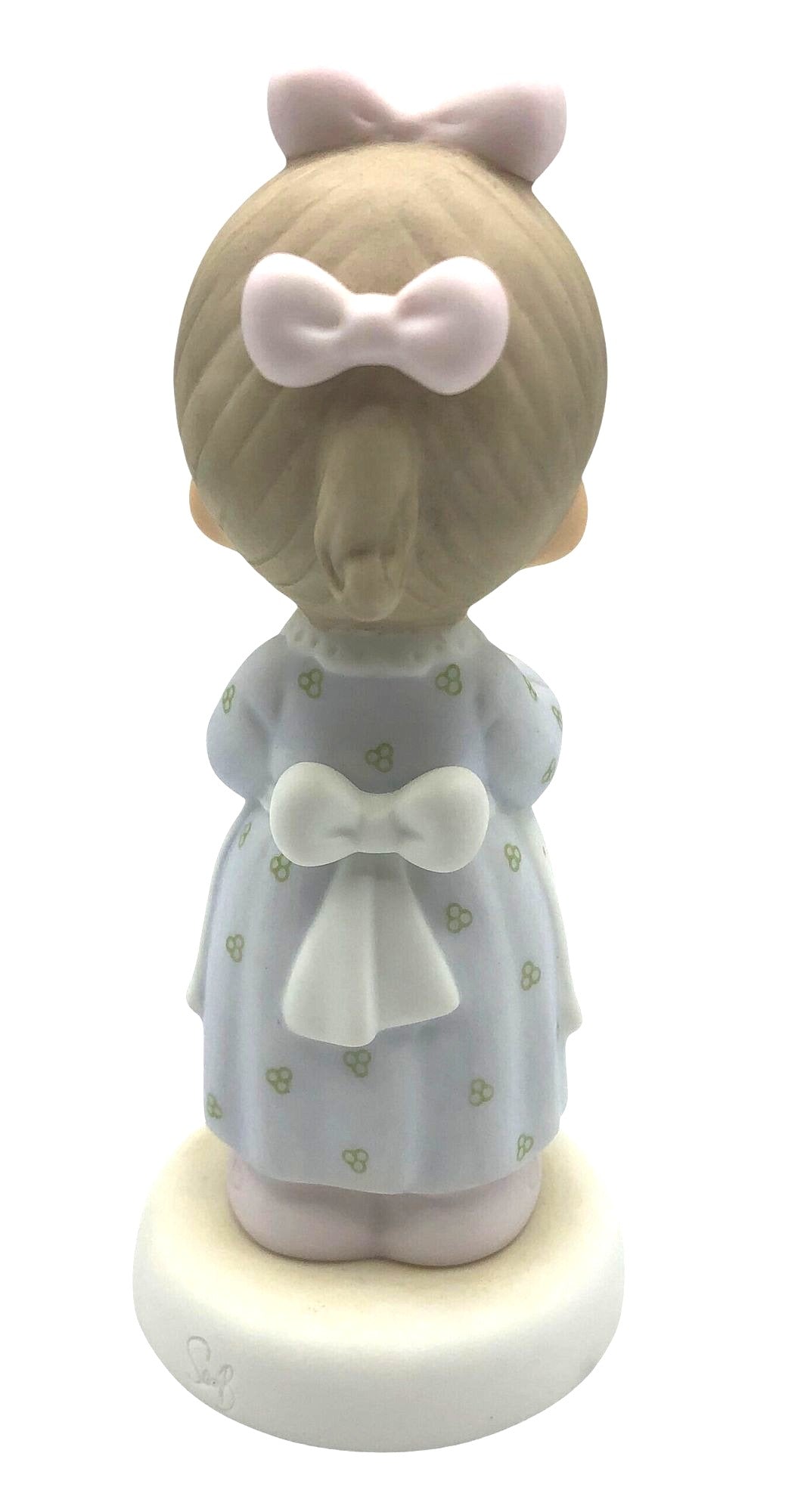 Precious Moments "The Good Lord Always Delivers" Porcelain Figurine. Features a little expectant mom perusing a book of baby names.