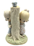 Jonathan and David (Precious Moments) 1979 "Thee I Love" Figurine.  Two children by a tree trunk with the carved message "I Love You"
