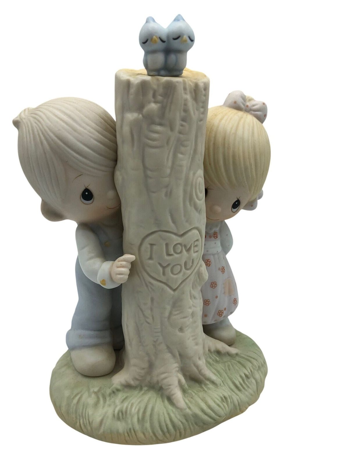 Jonathan and David (Precious Moments) 1979 "Thee I Love" Figurine.  Two children by a tree trunk with the carved message "I Love You"