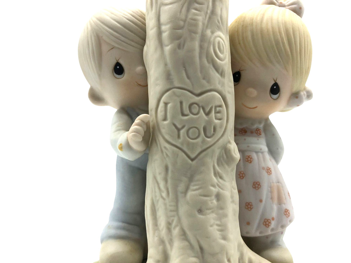 Jonathan and David (Precious Moments) 1979 "Thee I Love" Figurine.  Two children by a tree trunk with the carved message "I Love You"