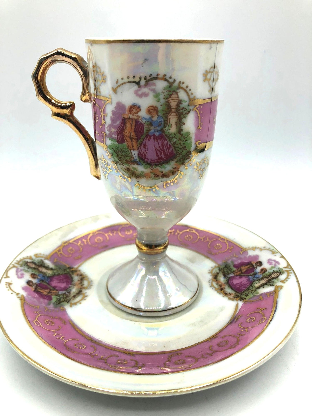Royal Vienna Classic China Pedestal Demitasse Cup and Saucer, Pink Bands with Courting Couple, Lusterware Finish and Gold Details and Trim.