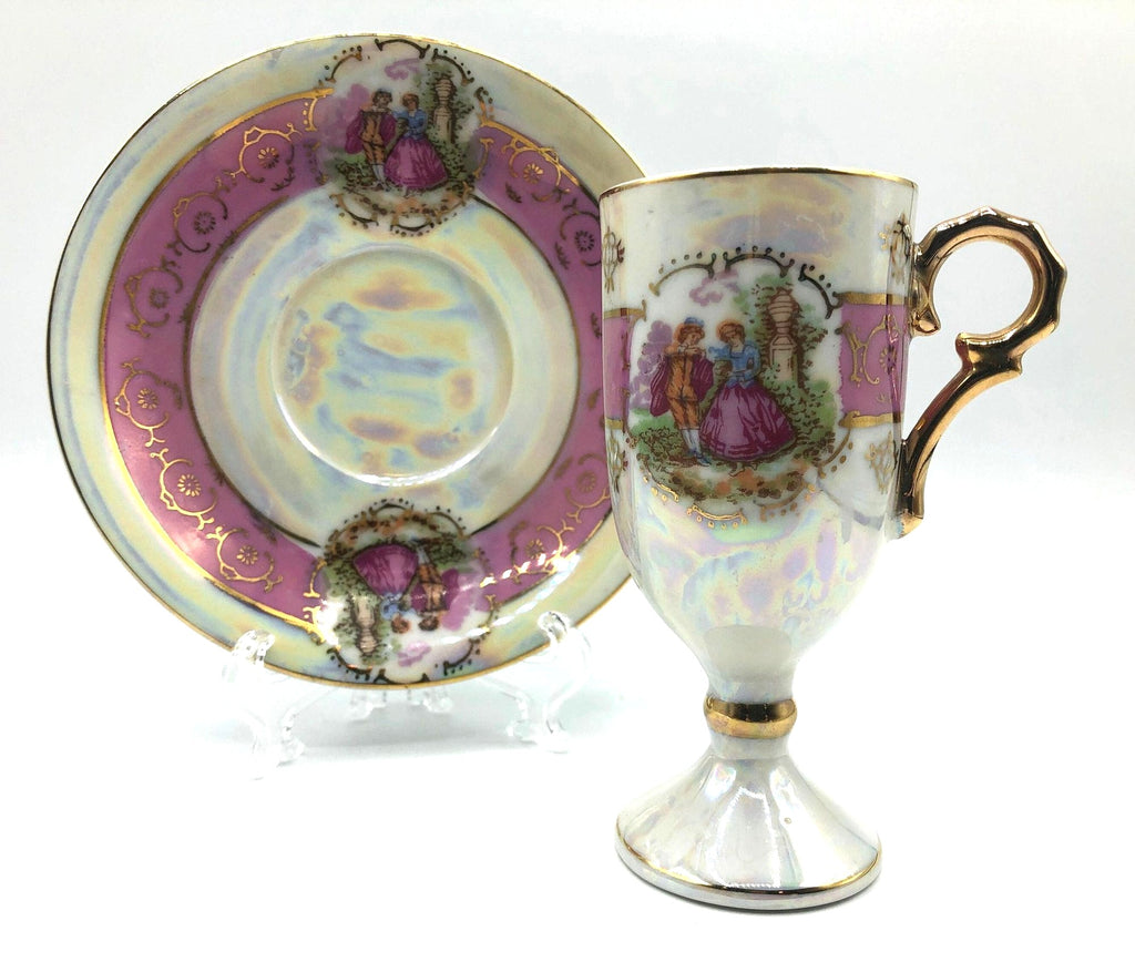 Royal Vienna Classic China Pedestal Demitasse Cup and Saucer, Pink Bands with Courting Couple, Lusterware Finish and Gold Details and Trim.