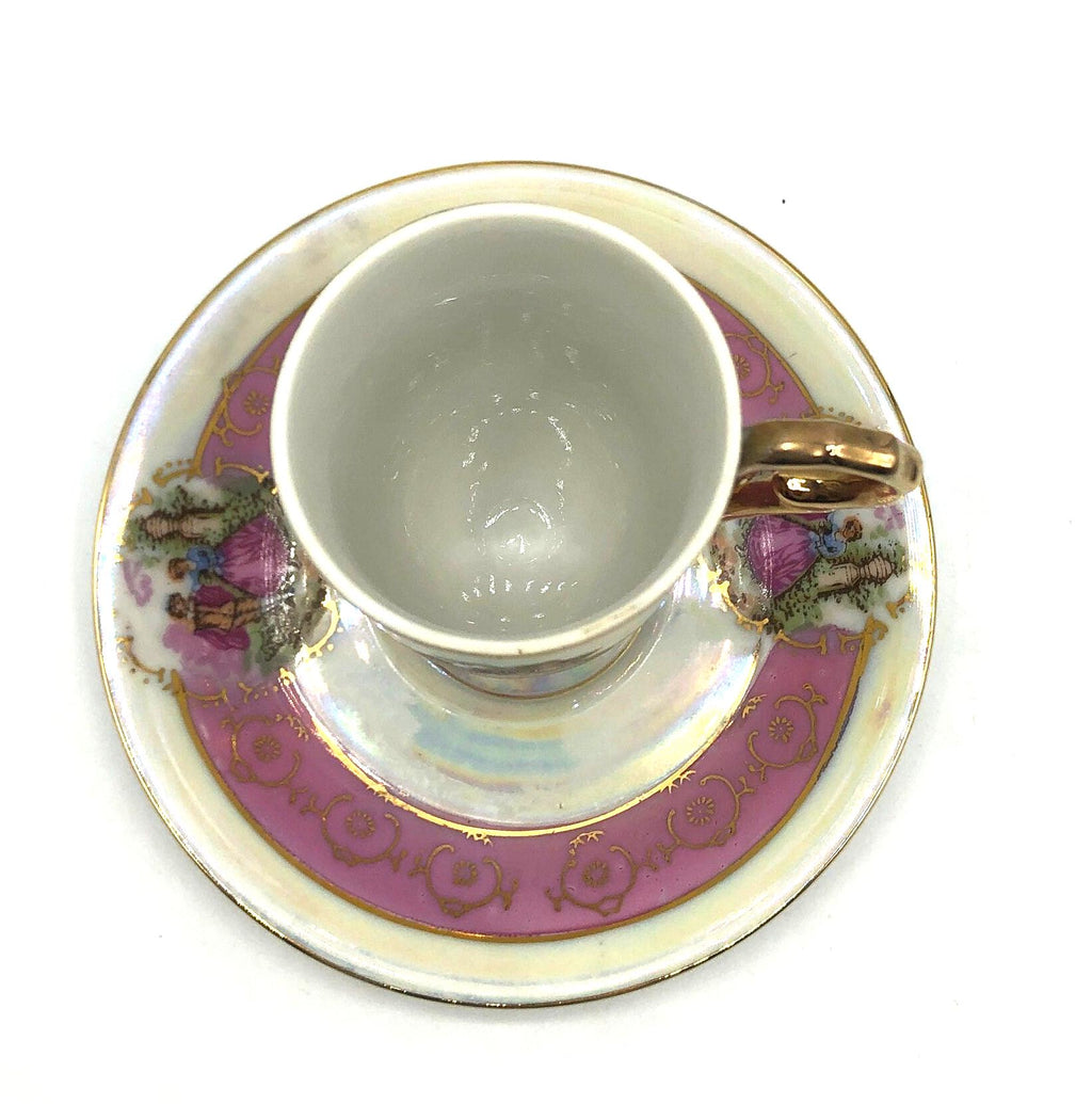 Royal Vienna Classic China Pedestal Demitasse Cup and Saucer, Pink Bands with Courting Couple, Lusterware Finish and Gold Details and Trim.