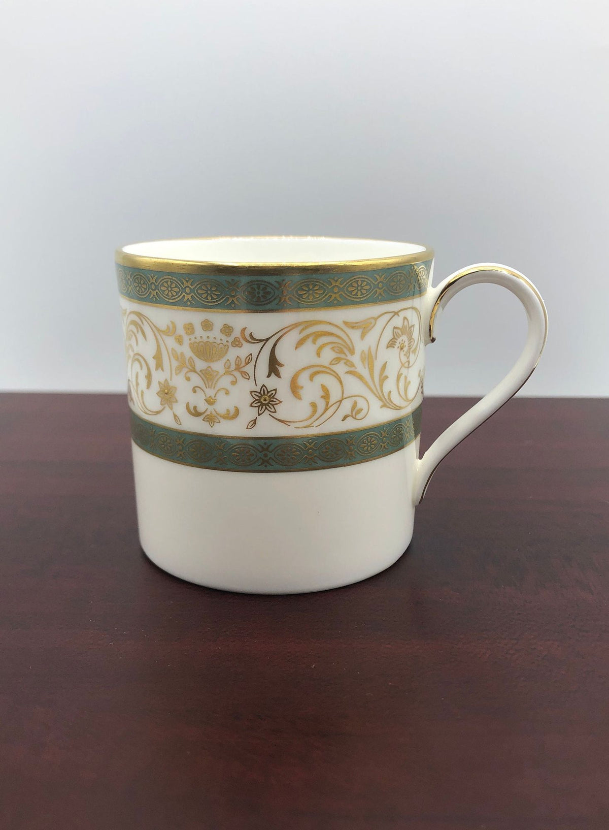 Minton Fine Bone China Demitasse Cup Aragon Pattern.  Fine Gold Details with Light Green Borders, Raised Flower Centers.