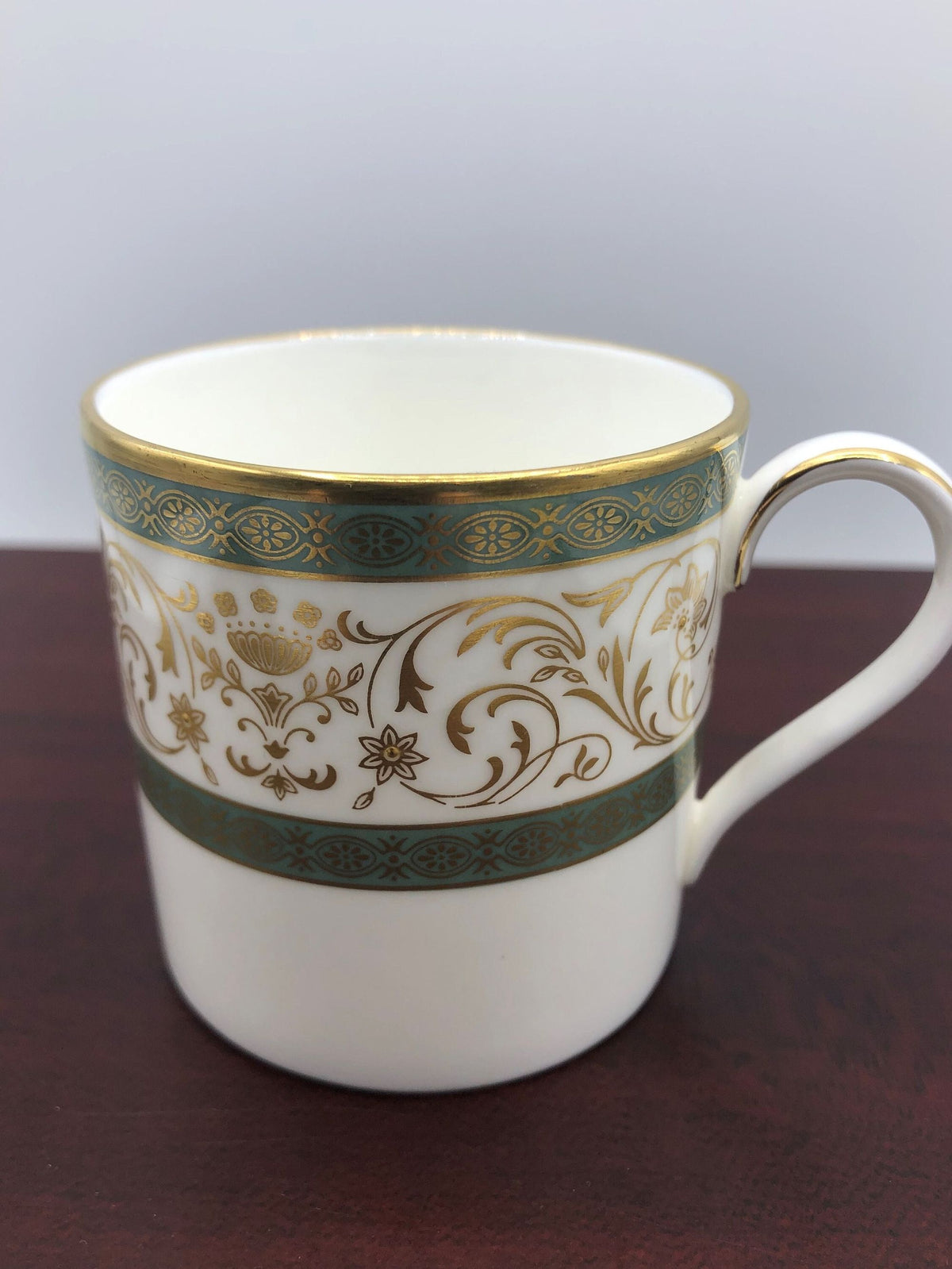 Minton Fine Bone China Demitasse Cup Aragon Pattern.  Fine Gold Details with Light Green Borders, Raised Flower Centers.