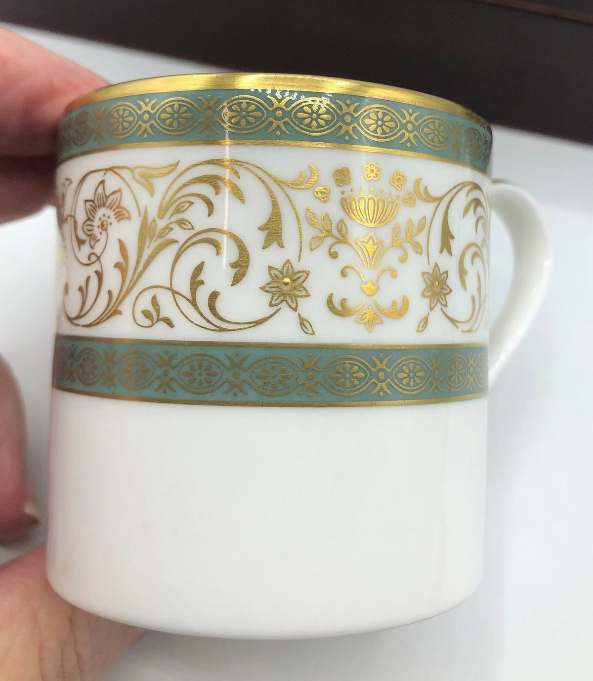 Minton Fine Bone China Demitasse Cup Aragon Pattern.  Fine Gold Details with Light Green Borders, Raised Flower Centers.