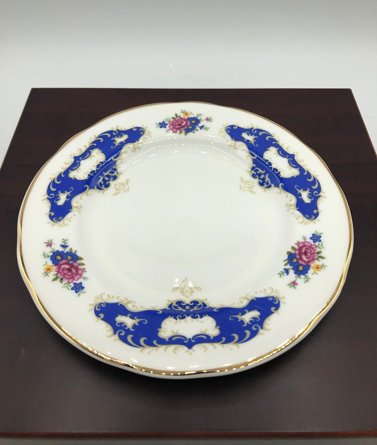 Fenton Bone China 6.5" Plate with Cobalt Blue Border Details and Deep Rose and Cobalt Blue Flowers, Gold Rim.
