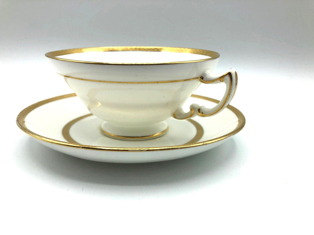 Vintage Mintons of England Footed Tea Cup and Saucer with Brilliant Gold Detail and Trim by Sim & Co. Troy NY.  Elegant and beautiful.