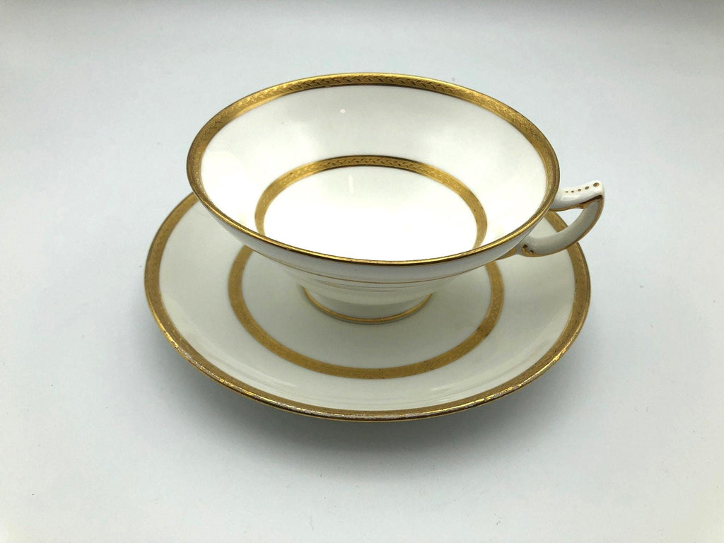 Vintage Mintons of England Footed Tea Cup and Saucer with Brilliant Gold Detail and Trim by Sim & Co. Troy NY.  Elegant and beautiful.