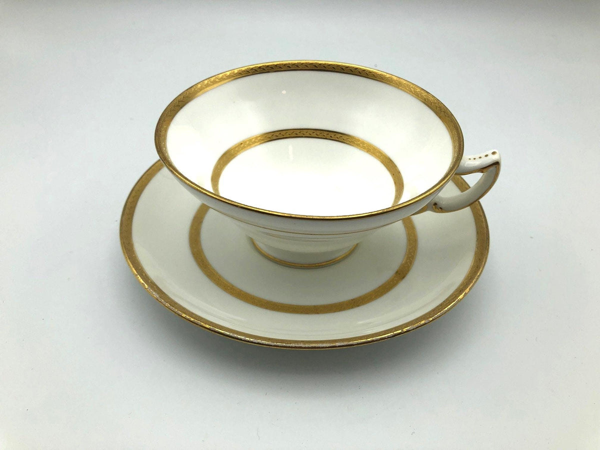 Vintage Mintons of England Footed Tea Cup and Saucer with Brilliant Gold Detail and Trim by Sim & Co. Troy NY.  Elegant and beautiful.