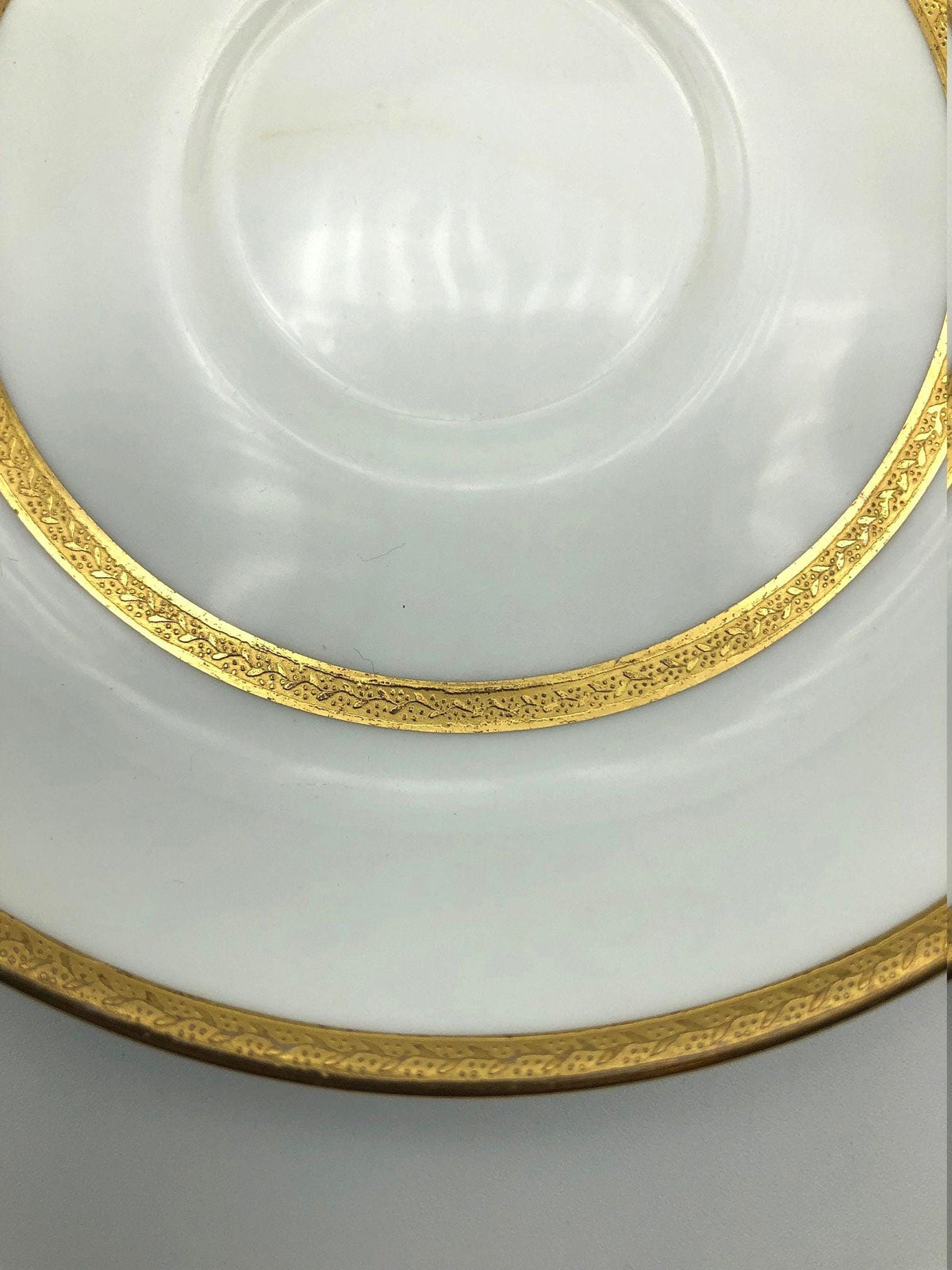 Vintage Mintons of England Footed Tea Cup and Saucer with Brilliant Gold Detail and Trim by Sim & Co. Troy NY.  Elegant and beautiful.