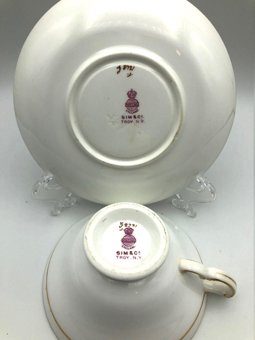 Vintage Mintons of England Footed Tea Cup and Saucer with Brilliant Gold Detail and Trim by Sim & Co. Troy NY.  Elegant and beautiful.