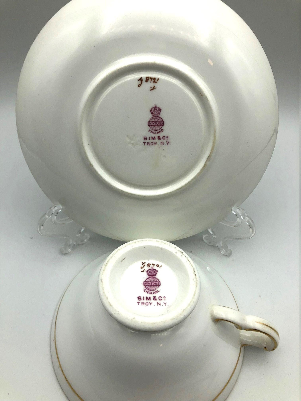 Vintage Mintons of England Footed Tea Cup and Saucer with Brilliant Gold Detail and Trim by Sim & Co. Troy NY.  Elegant and beautiful.