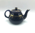 Vintage Hall's Cobalt Blue Teapot with Gold Flower Pattern and Gold Trim.  8.5" Spout to Handle and 5.5" high with lid.  6 Cup Capacity.