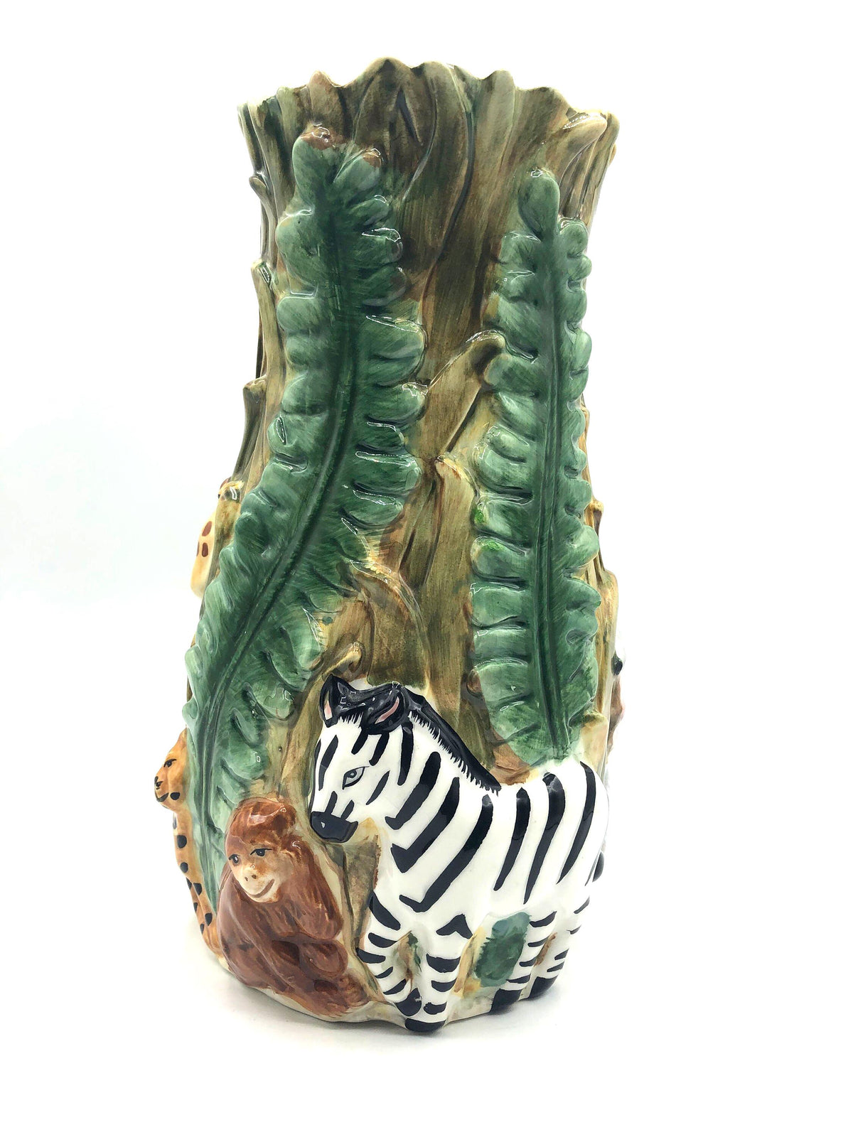 Dimensional Ceramic Vase with Animals in the Jungle by Jay Imports.  Large size 5.5" wide and 10" high. Bold colors, Gloss finish.