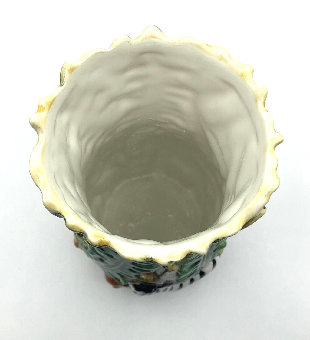 Dimensional Ceramic Vase with Animals in the Jungle by Jay Imports.  Large size 5.5" wide and 10" high. Bold colors, Gloss finish.