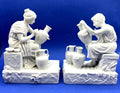 Vintage Neoclassical Greek Roman White Bisque Porcelain Figurines Depicting Male and Female Potters Shaping and Detailing Vases. 8" tall