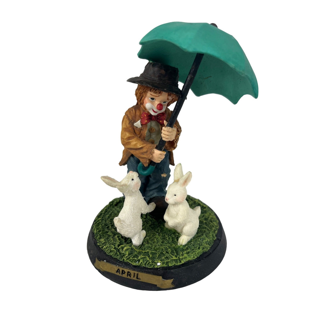 Little Emmett April Figurine With Bunnies And Umbrella in original box.