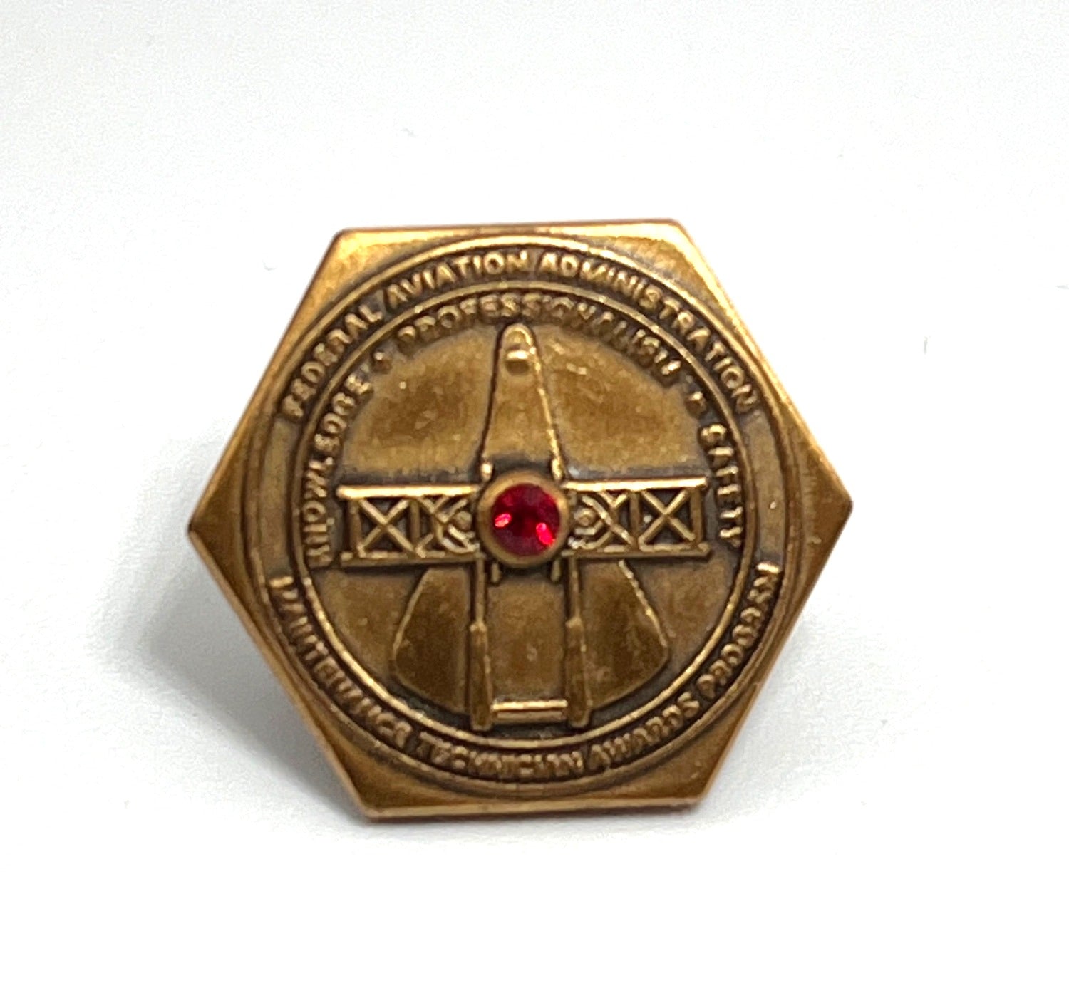 Federal Aviation Administration Hexagonal Gold Pin With Red Gemstone Accent