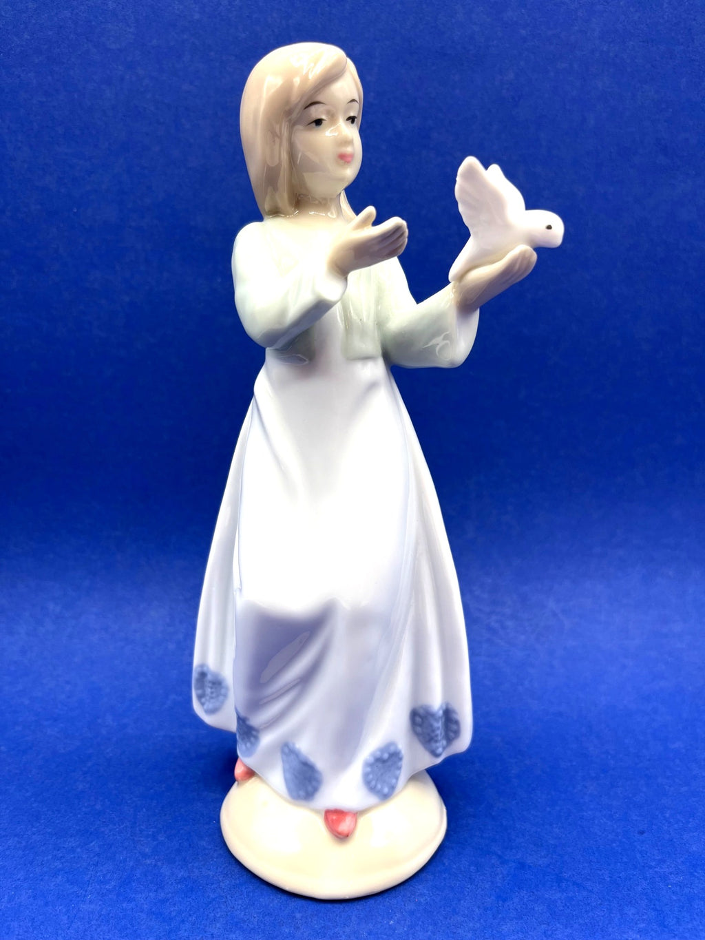 Porcelain Girl Figurine With Dove Blue & White Dress 8 Inches Tall