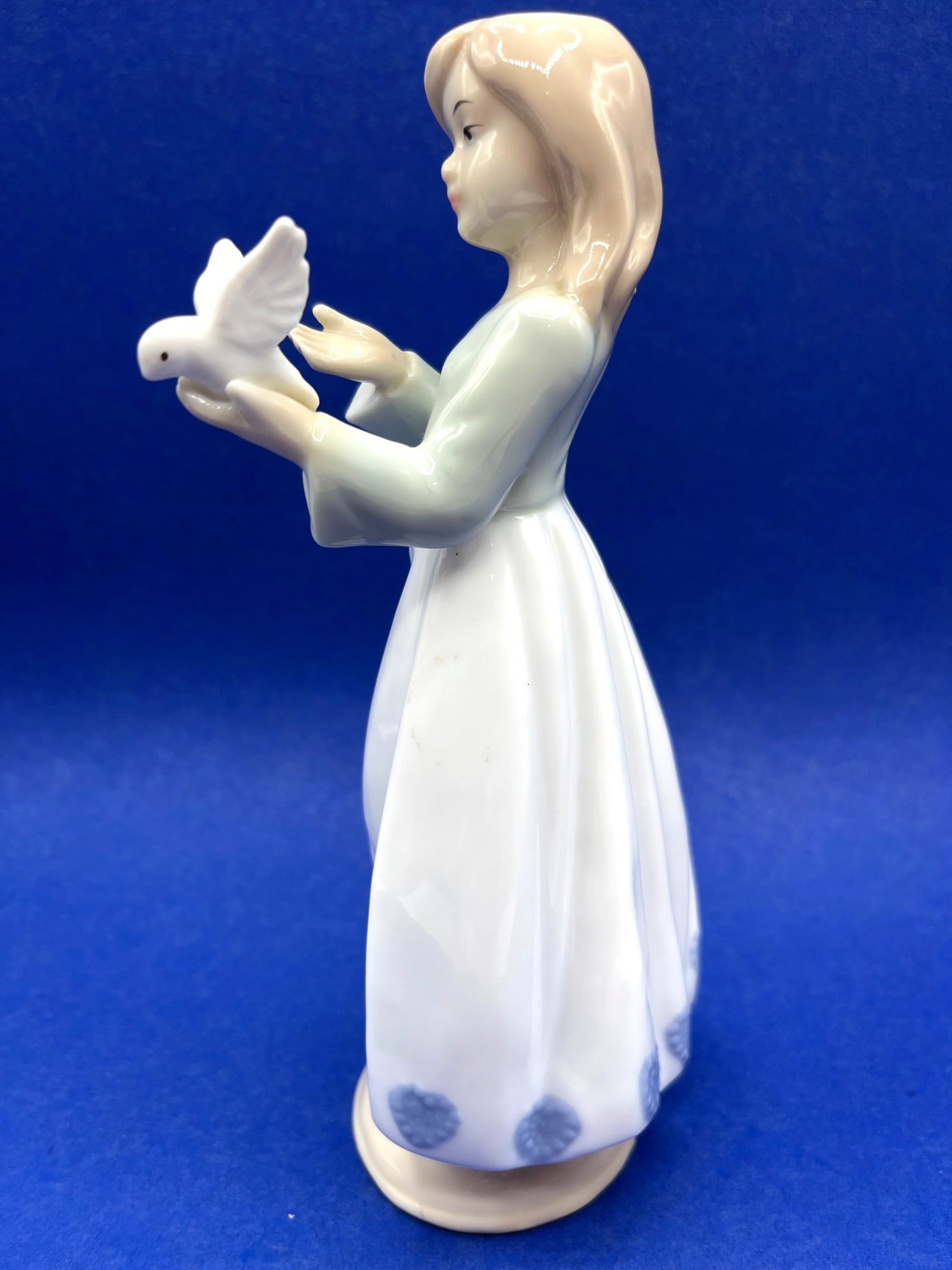 Porcelain Girl Figurine With Dove Blue & White Dress 8 Inches Tall