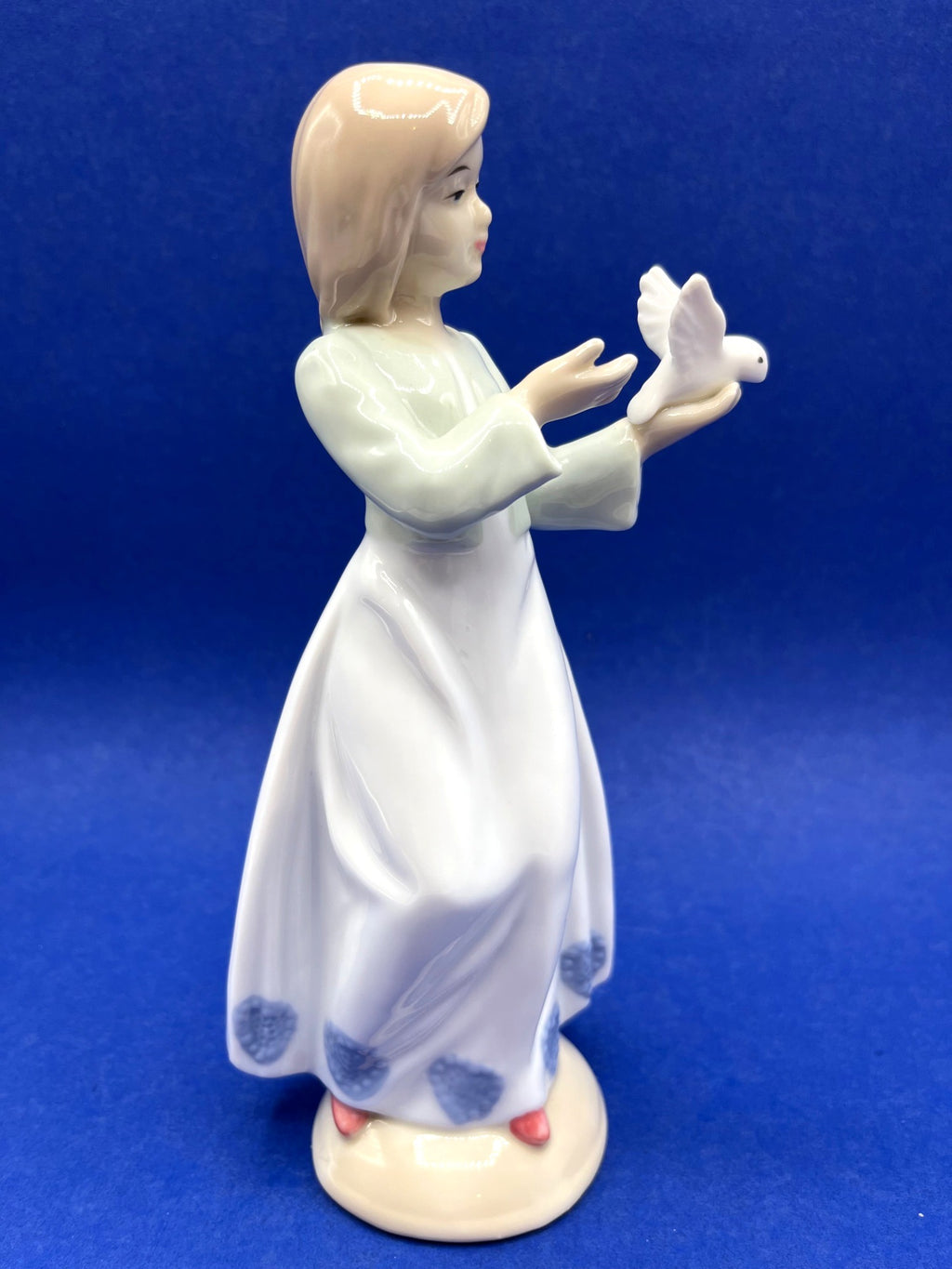 Porcelain Girl Figurine With Dove Blue & White Dress 8 Inches Tall