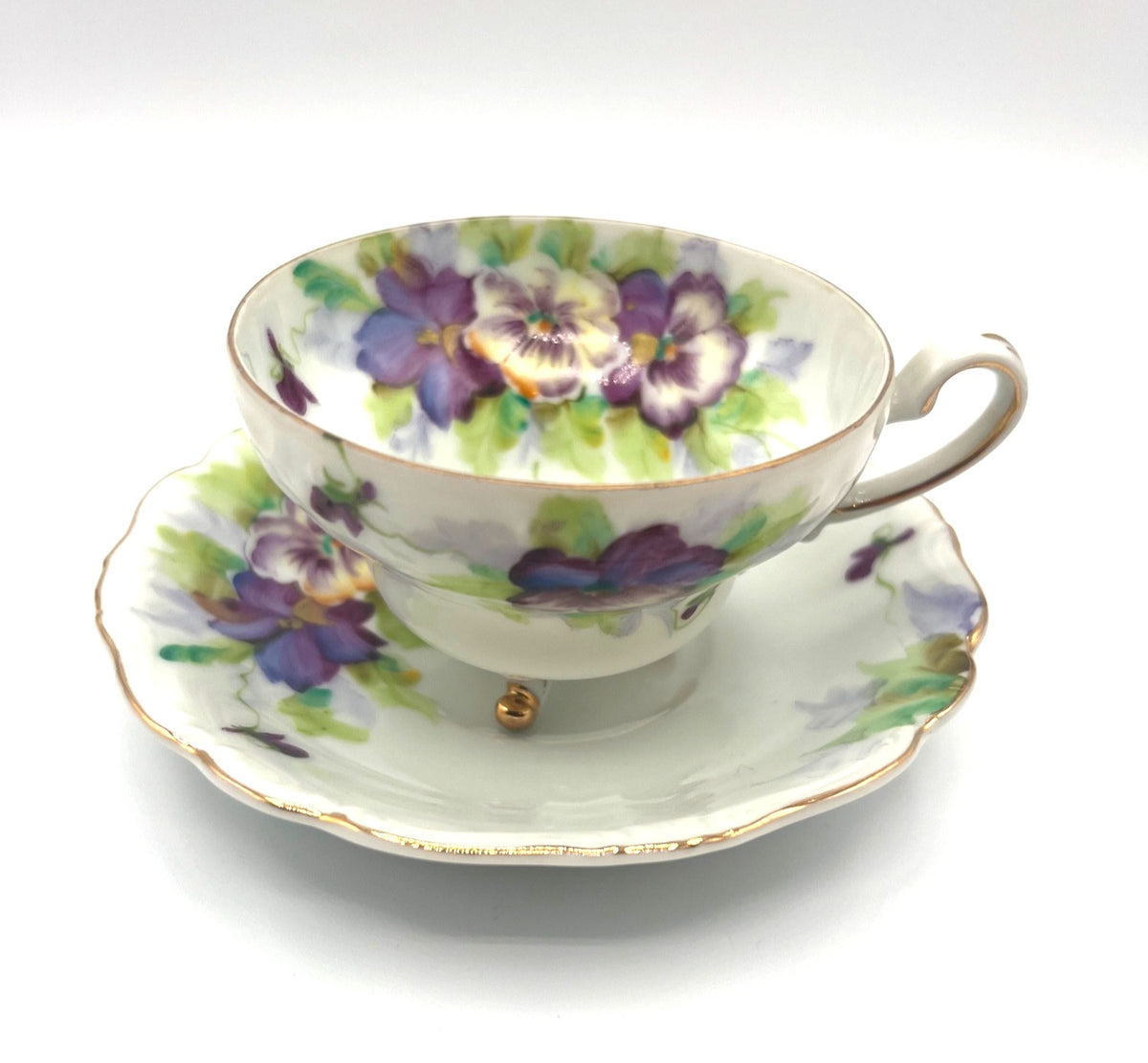 Vintage Hand Painted Footed Teacup & Saucer Set With Purple & Green Pansies Floral Design Made In Occupied Japan