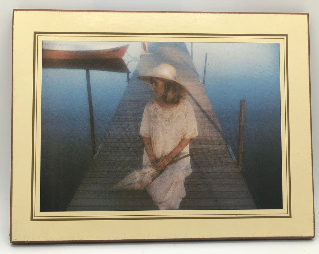 Art Print of Young Woman on a Pier with Hat and Umbrella. Mounted on a Pressboard Plaque. By Athena International, Made in England.
