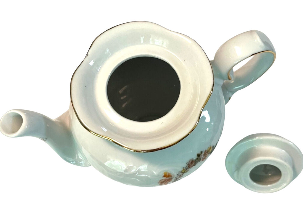 Vintage Trisa Porcelain Teapot and Lid With Cherub Design & Gold Trim 8.5" tall