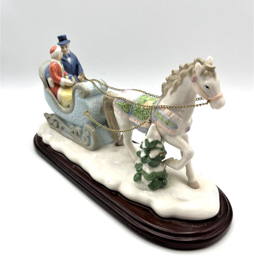 Avon Porcelain Figurine Collectible Couple in Horse-Drawn Sleigh from Moments and Memories Collection 2002