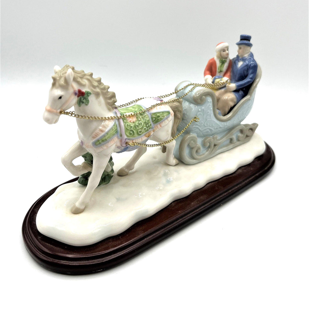 Avon Porcelain Figurine Collectible Couple in Horse-Drawn Sleigh from Moments and Memories Collection 2002