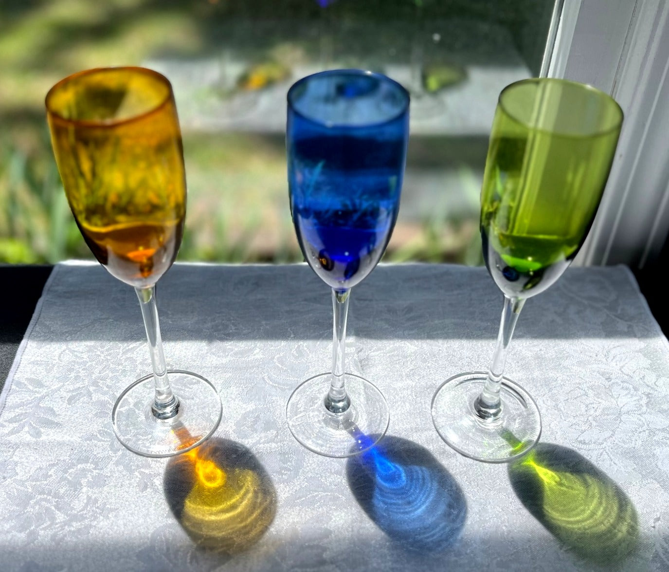 Set Of 3 Colorful Glass Champagne Flutes In Amber Blue & Green With Clear Stems 9" tall