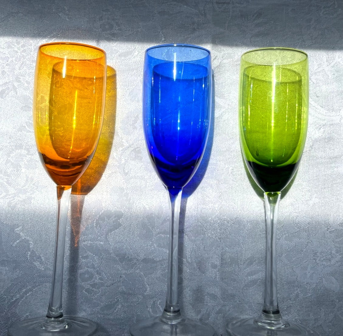 Set Of 3 Colorful Glass Champagne Flutes In Amber Blue & Green With Clear Stems 9" tall