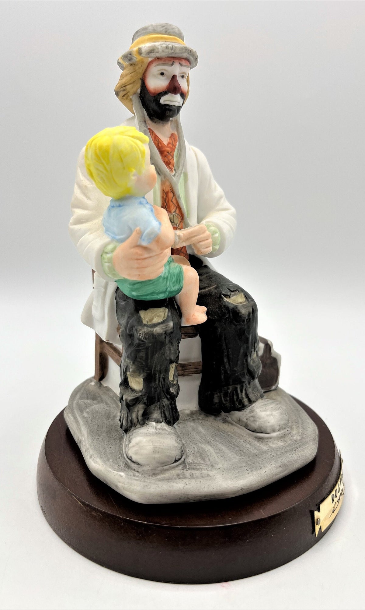 Vintage Emmett Kelly Jr. Doctor Porcelain Figurine The Doctor with Solid Wood Base by Flambro. 5.25" wide x 8" tall