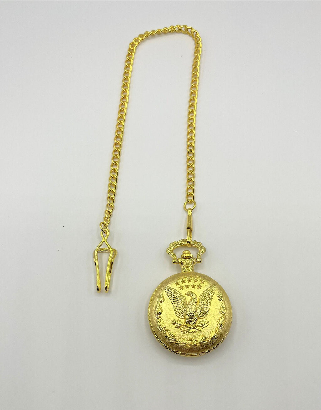 Liberty Eagle Gold Tone Pocket Watch with Chain, Dimensional Liberty Eagle on the front. New Battery Installed.  1.75" diameter