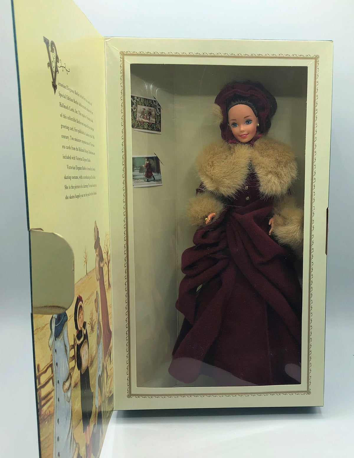 1994 Victorian Elegance Barbie Special Edition for Hallmark. Dressed in a Burgundy Skating Costume with Hat and Muff and Ice Skates. 11"
