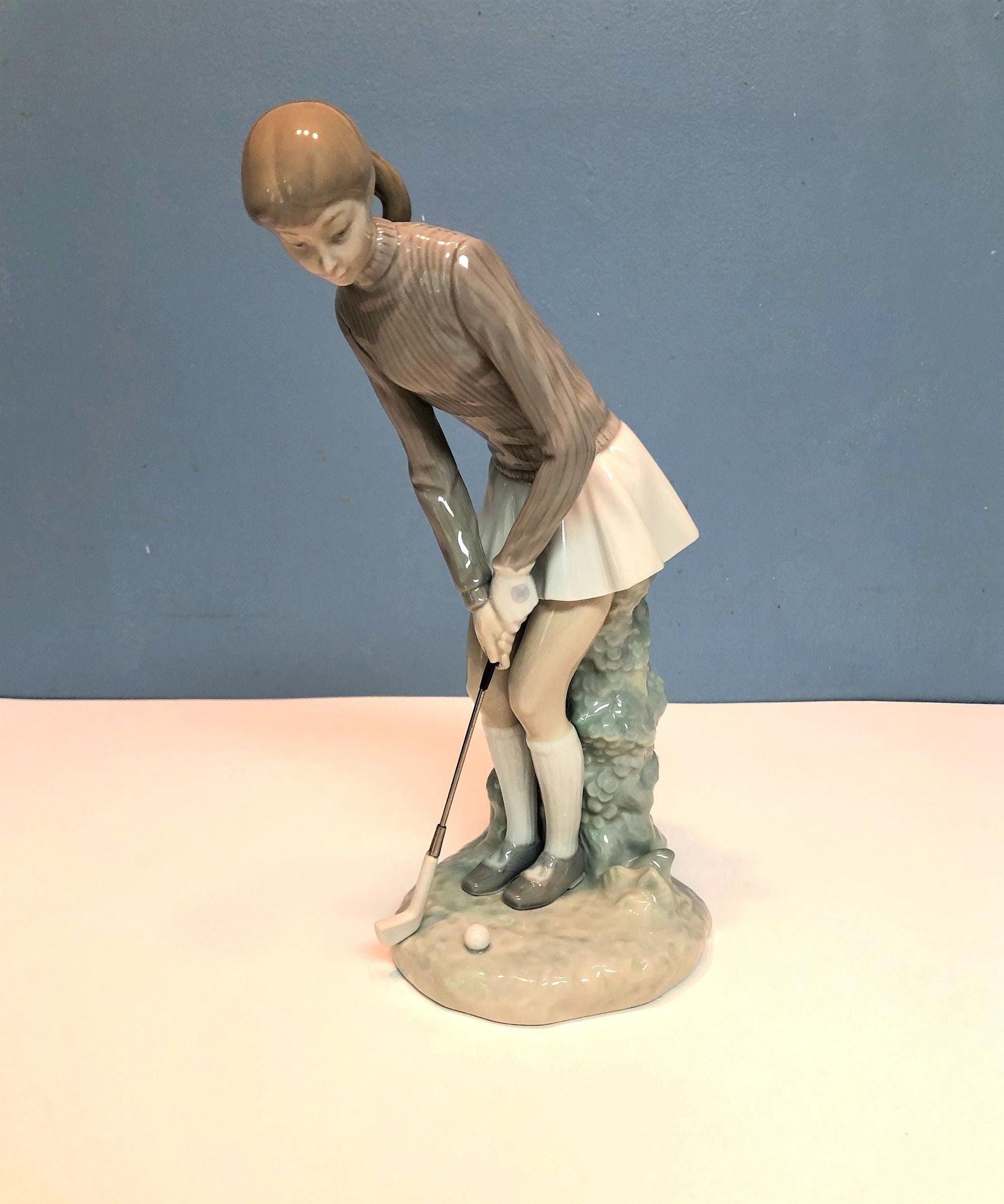Vintage Lladro Retired Figurine, Young Woman Golfer Making A Putt.  4.5 x 5" x 10.5" tall