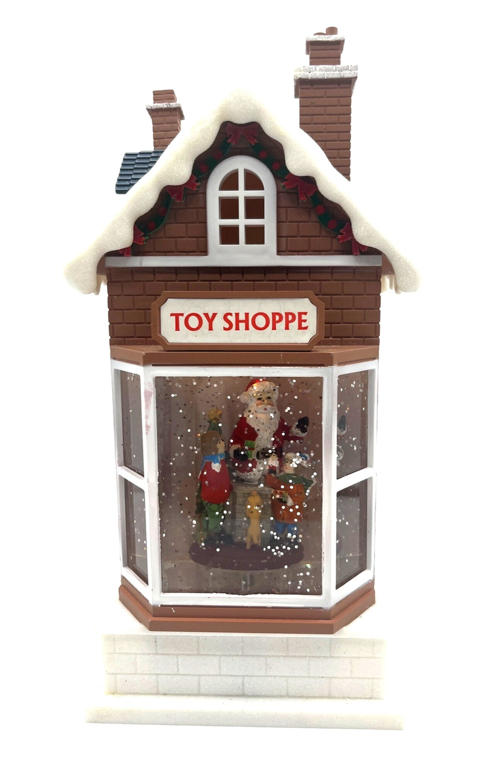 Light-Up Musical Christmas Toy Shoppe Snow Globe Decoration With Santa Scene 11" tall